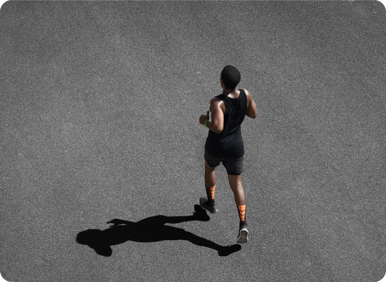 Top-down view of a runner mid-stride